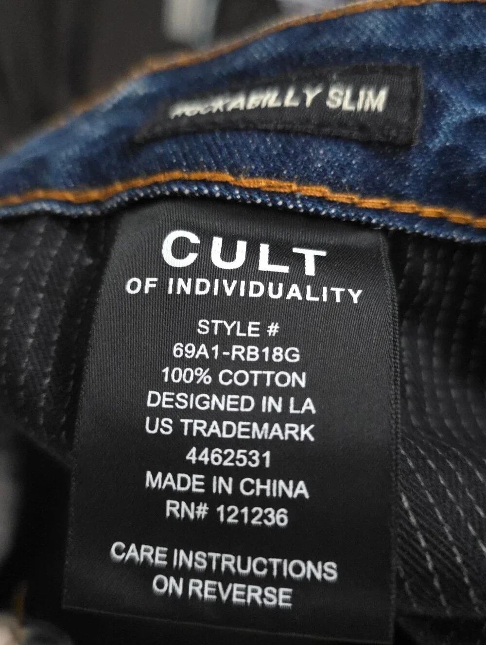 Cult of Individuality Distressed Skinny Jeans in Faded Blue with Zipper Cuffs